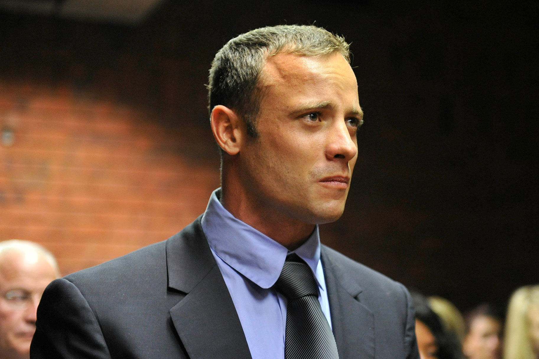 Oscar Pistorius stands during his bail application in 2013