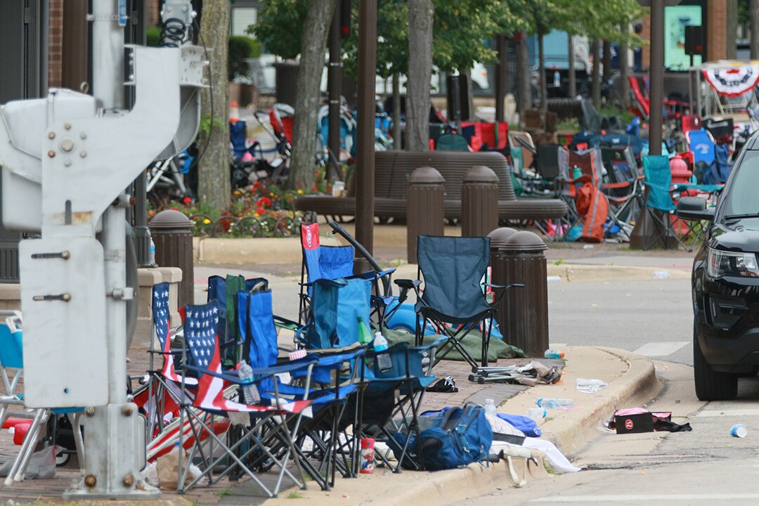 Belongings are shown left behind at the scene of a mass shooting along the route of a Fourth of July parade