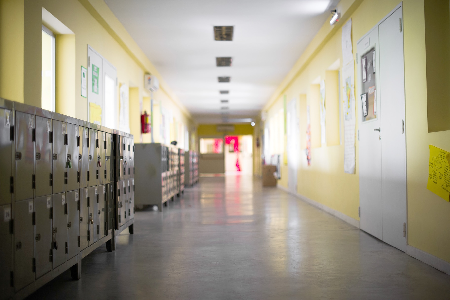 An Empty School Hallway with lockers