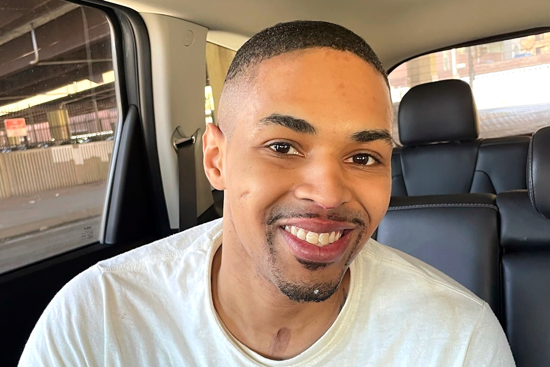 Keith Davis Jr.smiles in a vehicle following his released from prison