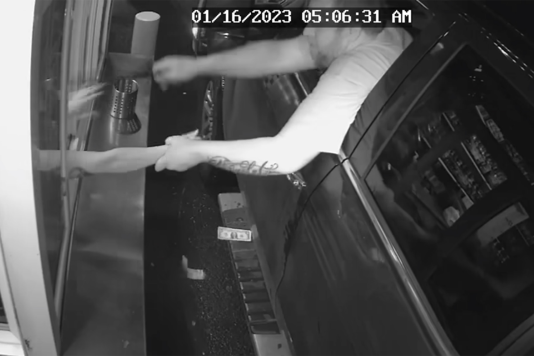The Suspect seen Grabbing Woman From Drive Thru