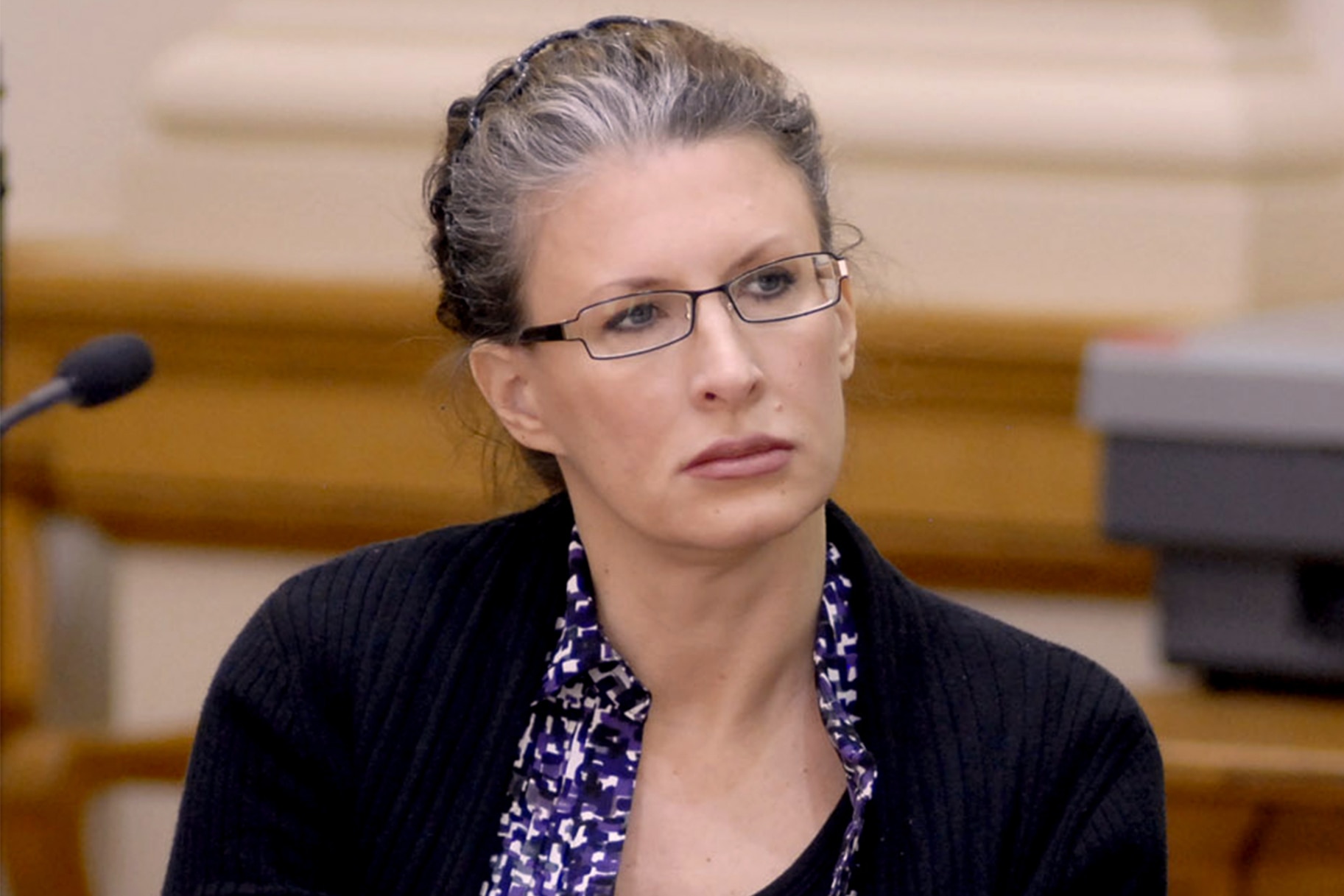 Tracey Richter sits in a courtroom