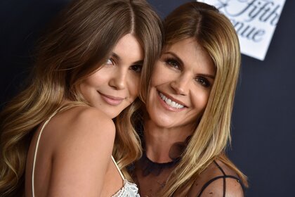 Actress Lori Loughlin (R) pictured here with daughter Olivia Jade Giannulli at a gala in February 2018