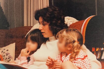 Linda Van Buskirk reading to her two daughters, featured in Buried in the Backyard 502