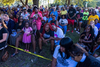 Trisha James (C) black shirt), Sabrina Rozier (Red hair white shirt) and Ieasia Gallion (4 year old daughter of one of the victims), all family member of Jereld Gallion, one of the victims of a deadly shooting that took place in Jacksonville, Florida on August 27, 2023.