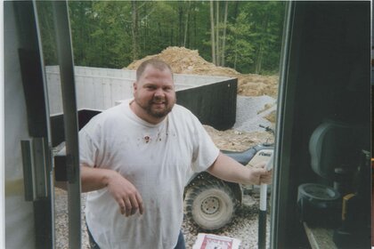 Billy Wagner smiles outside in The Pike County Murders Season 1 Episode 1