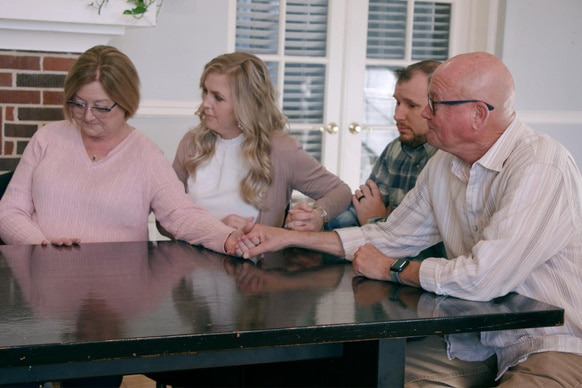 The Victim's Family Members sit at a table on Cold Justice episode 711