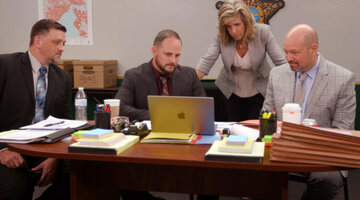 A scene in Cold Justice of the team in the 'War Room'