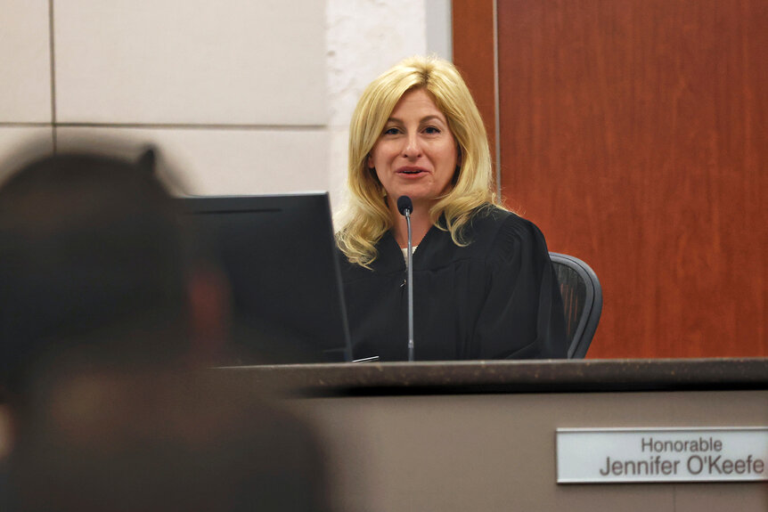 Judge Jennifer O'Keefe listens during opening arguments of the Paul Flores murder trial