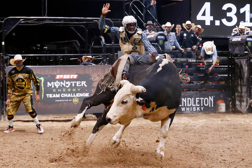Ouncie Mitchell aka Demetrius Allen rides bull Crack Attack during the Monster Energy Team Challenge