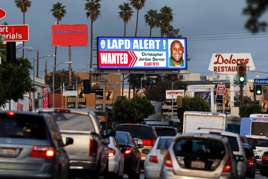 A Christopher Dorner wanted billboard along Santa Monica Boulevard