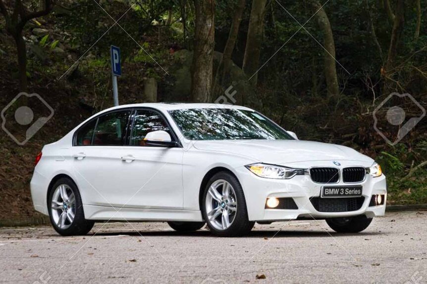 A white 2013 BMW Model 320 that Aaron Pennington is believed to be driving.