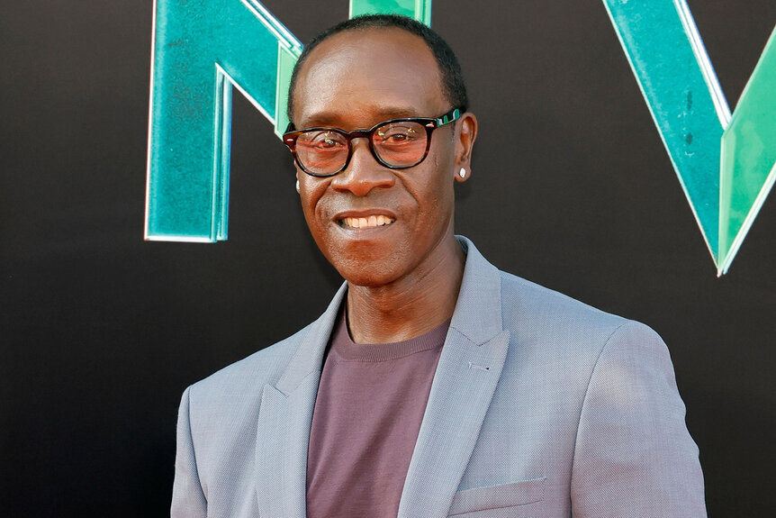 Don Cheadle wears a grey suit and glasses on the red carpet at Marvel Studios' "Secret Invasion" launch